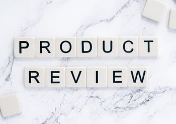 PRODUCT REVIEWS spelled with tiles.