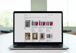 eBay store on a silver laptop computer showing duplicate iPhone case listings.