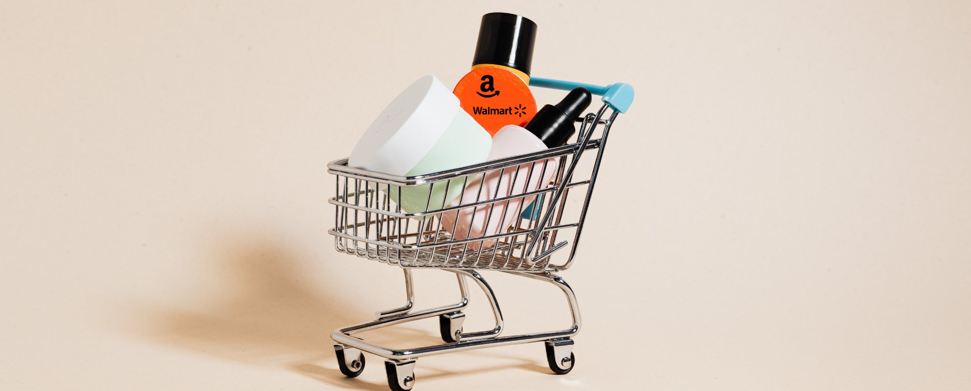 Small shopping cart with cosmetics bottles.