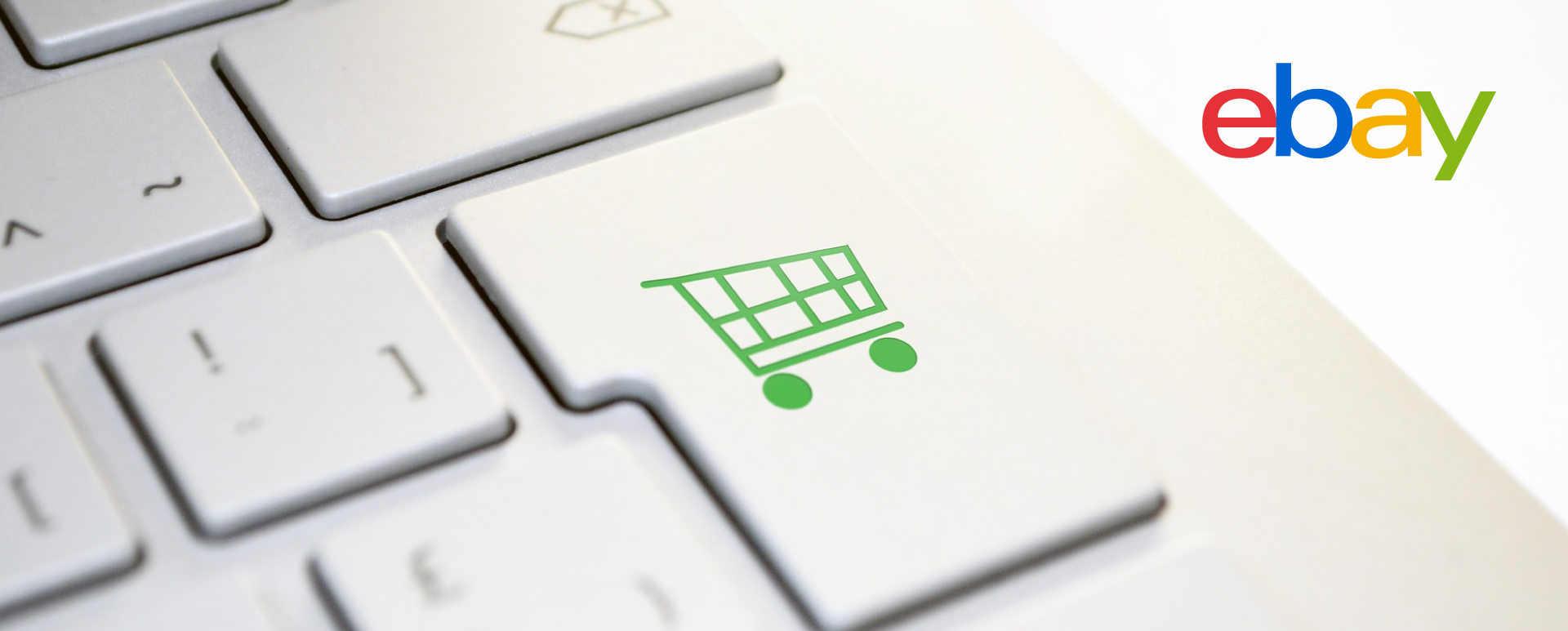 eBay shopping cart icon on a keyboard.